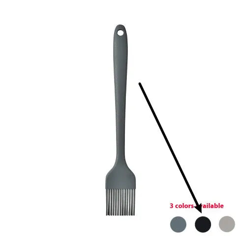 12-piece black silicone kitchen utensil set including spatula, spoon, and claw tools in a rotating storage bucket on a kitchen counter.