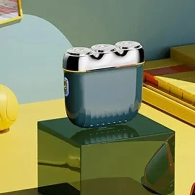 Mini three-head magnetic electric shaver showing floating cutter design and colour options
