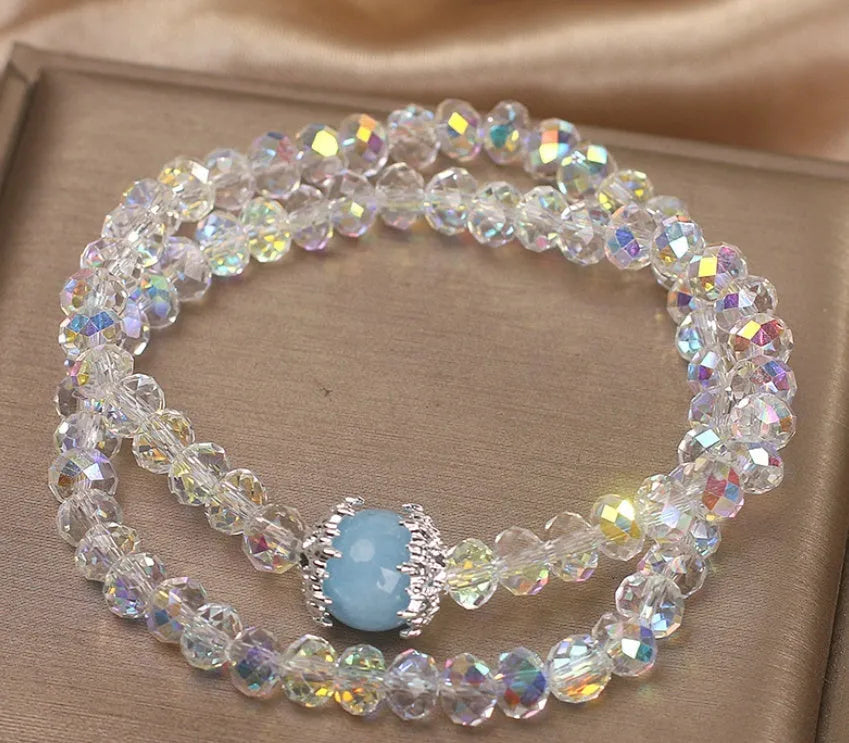 White crystal double ring bracelet for women with electroplated finish on light background