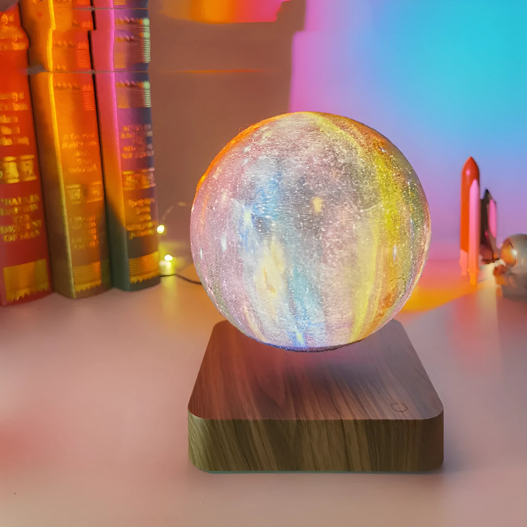 Square walnut coloured levitating moon lamp with galaxy light effect rotating above a circular base.