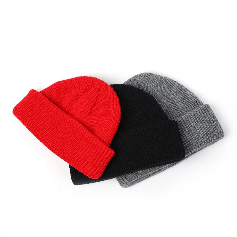 Knitted wool hat in black, claret red, grey, pink, red, white and yellow
