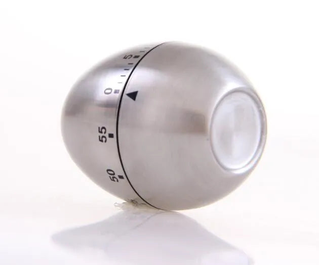 Stainless steel mechanical kitchen timer with egg shape design showing dial and measurement scale