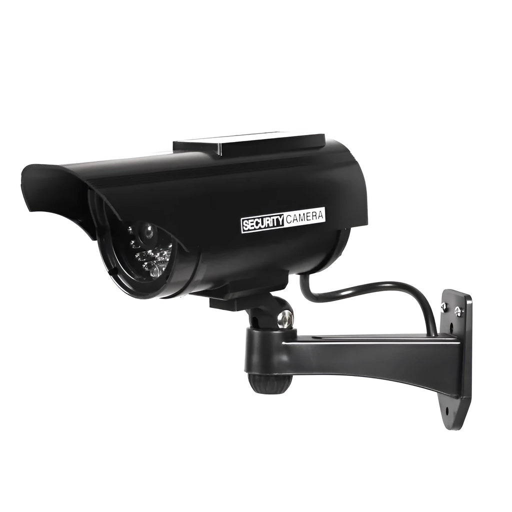 Solar powered fake security camera in black with solar panel on top and red LED light