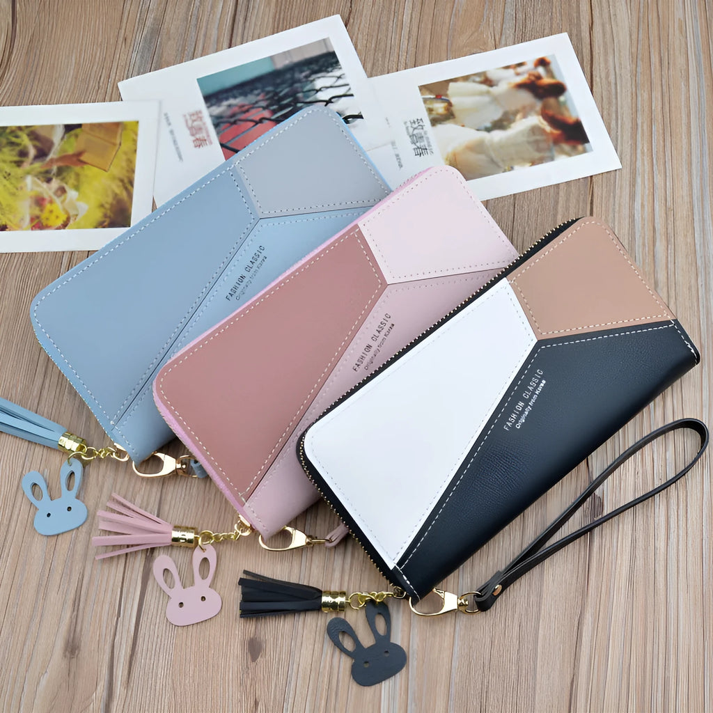 Women's long zipper tassel clutch bag with stitching detail in Black, Blue or Pink, horizontal square shape.