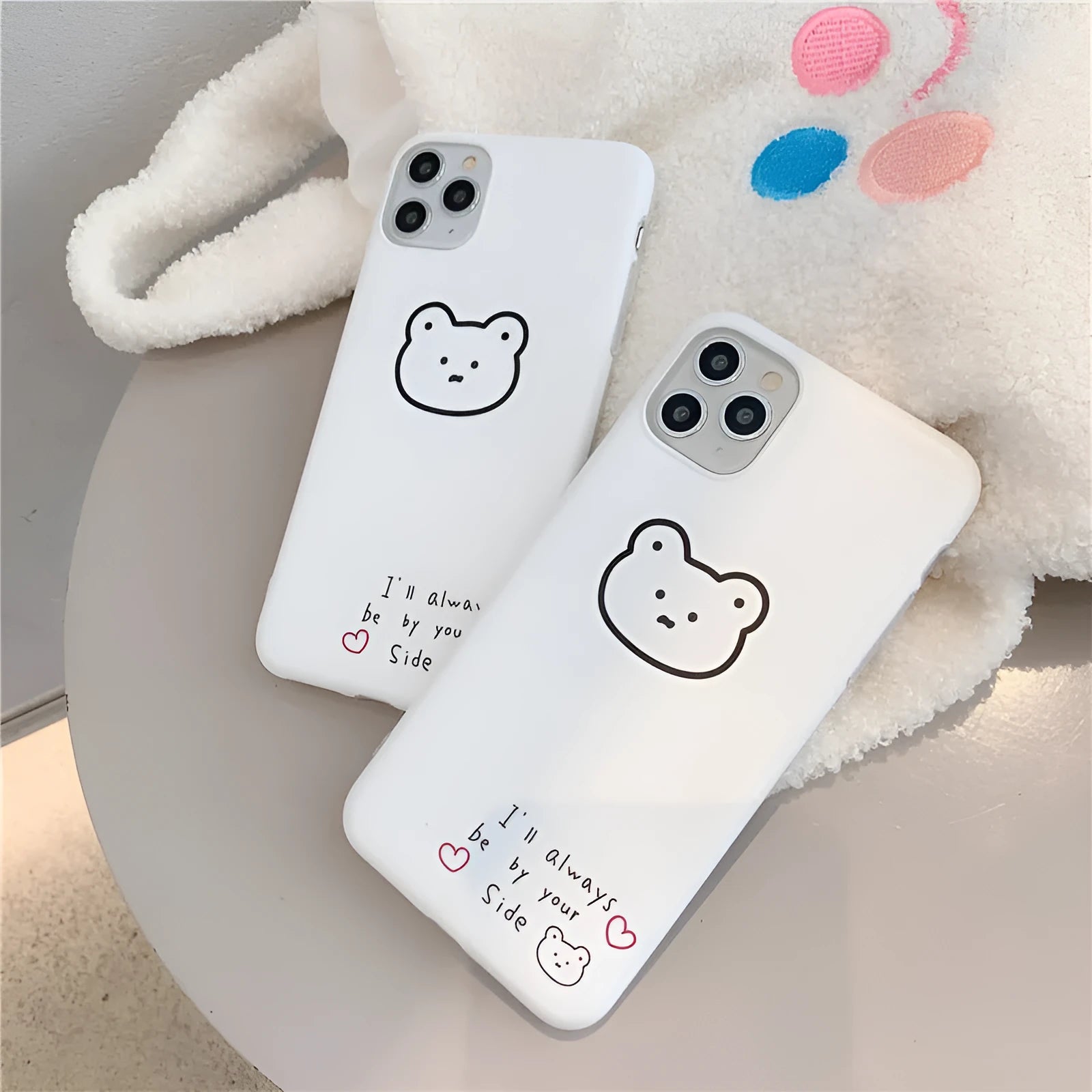 Cartoon bear design on a soft silicone back cover case for an Apple iPhone.
