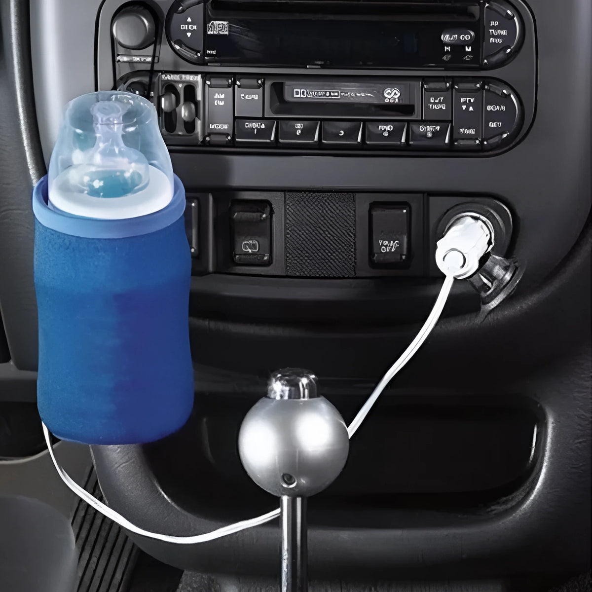 Blue portable baby bottle warmer with 12V car cigar lighter cable, carbon fibre heating, and detachable inner case