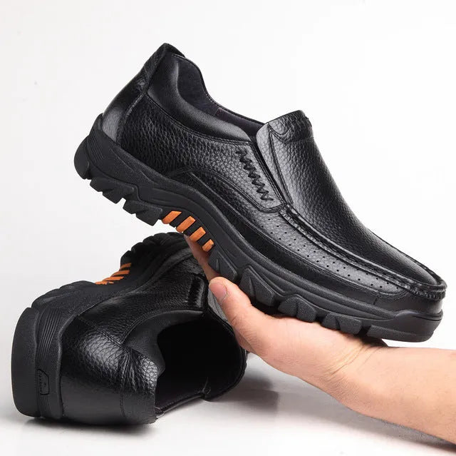 Men's black cowhide leather slip-on business casual shoes with a rubber sole