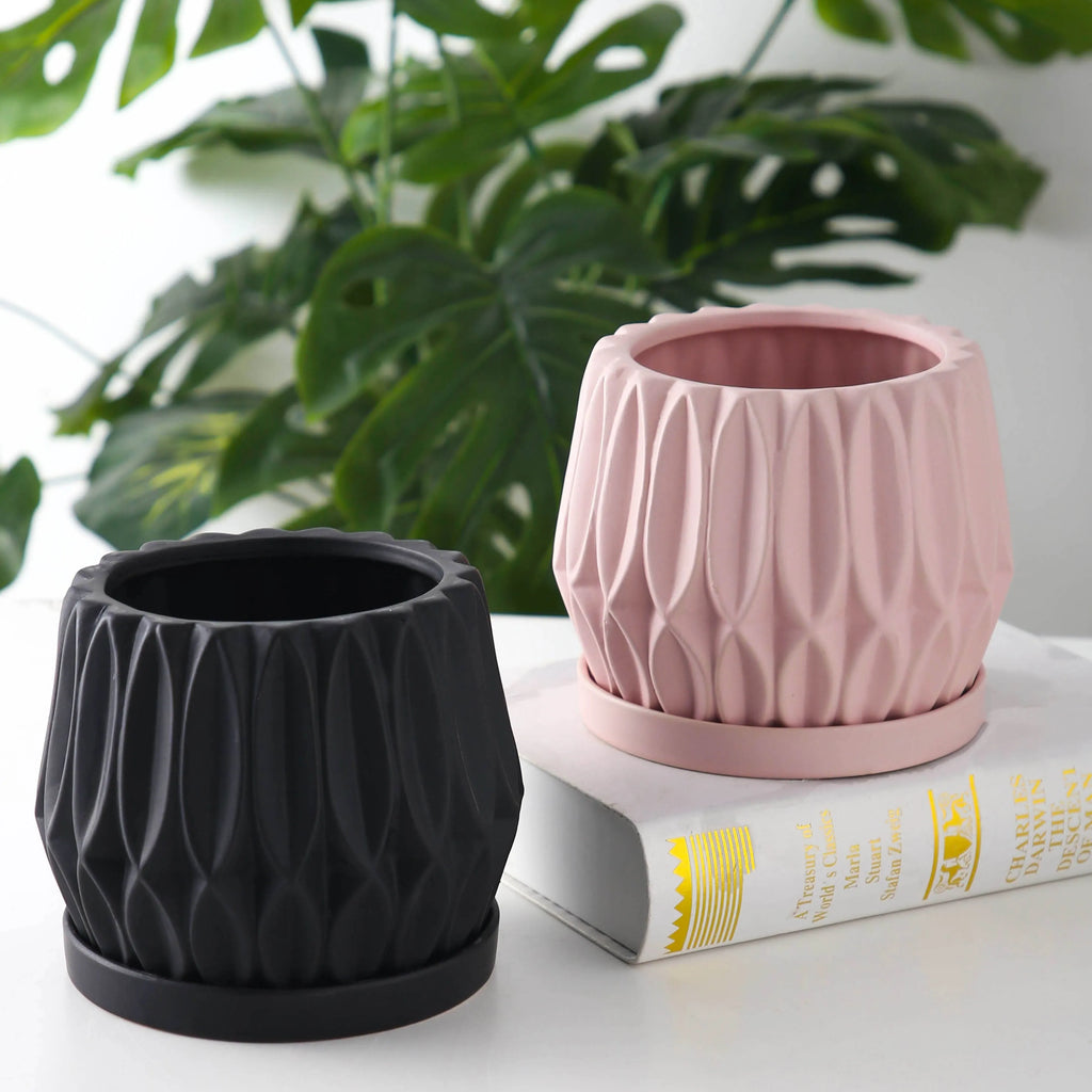 Grey ceramic tabletop flowerpot for plants with simple design and medium size