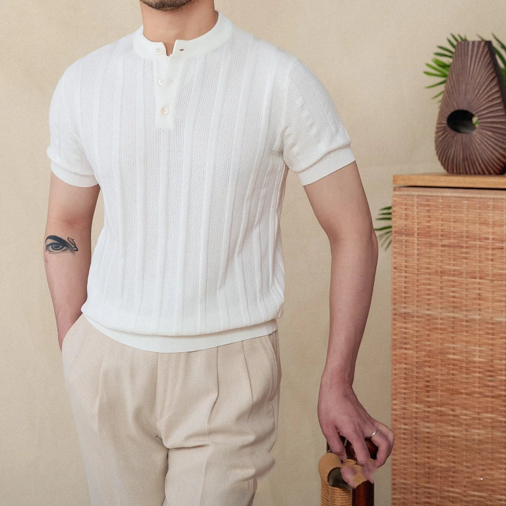 Men's creamy-white cotton short-sleeved T-shirt with a Henry collar and subtle sunken stripe pattern laid flat.