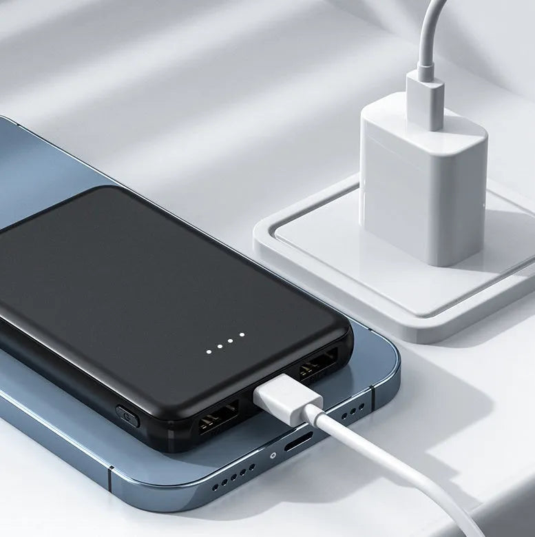 Black and white electric heating vest power bank showing 10000mAh and 5000mAh capacity options.