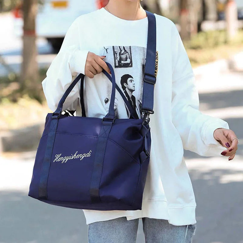 Blue Oxford cloth medium travel duffel bag with zipper and soft handle