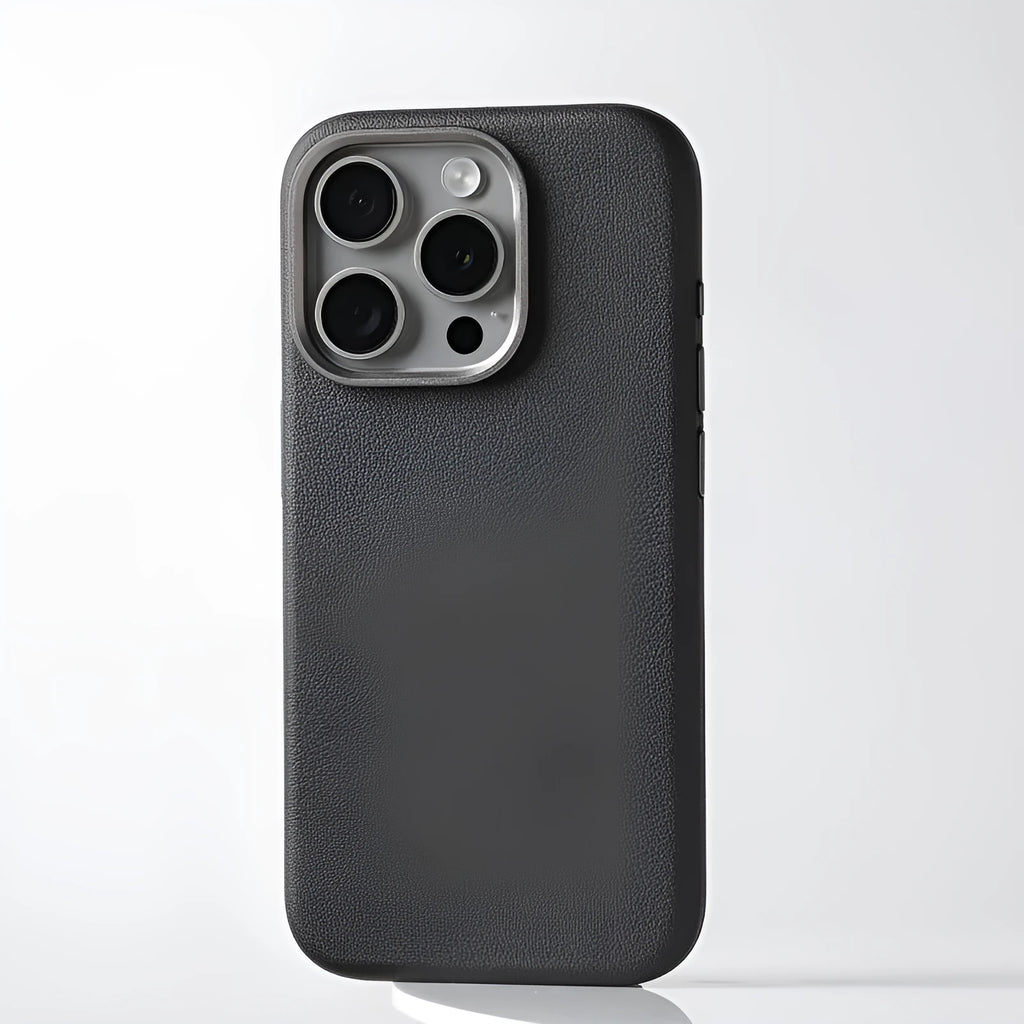 A black genuine leather iPhone case with a built-in metal alloy camera lens protector and MagSafe magnets.