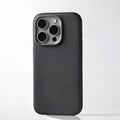 A black genuine leather iPhone case with a built-in metal alloy camera lens protector and MagSafe magnets.