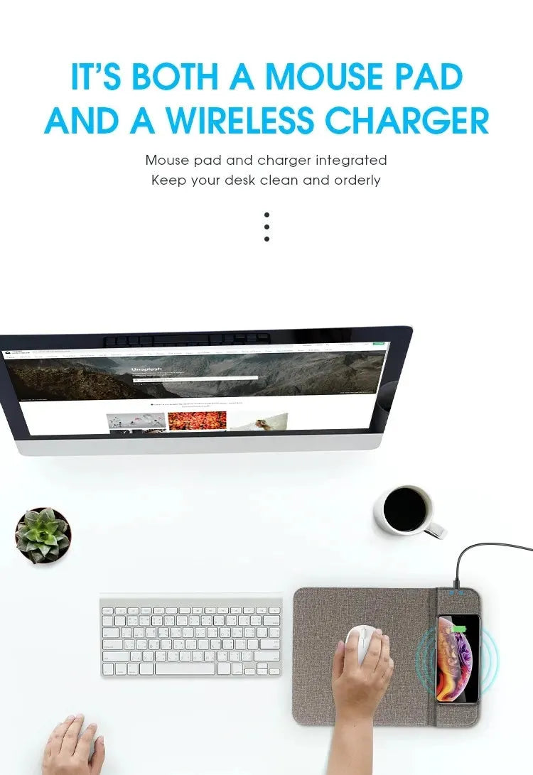 Grey foldable fabric phone holder with smartphone charging wirelessly on a wooden desk