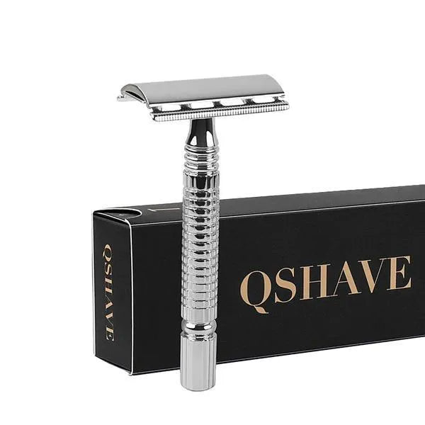 Double edged safety razor and blade in a storage box, a traditional wet shaving kit.