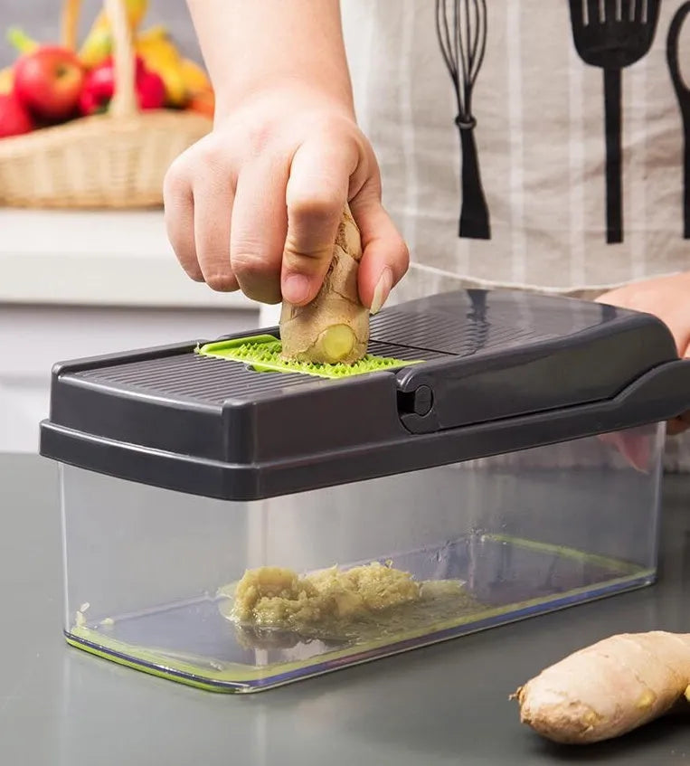 Multifunctional vegetable cutter with 7 stainless steel blades on a kitchen countertop