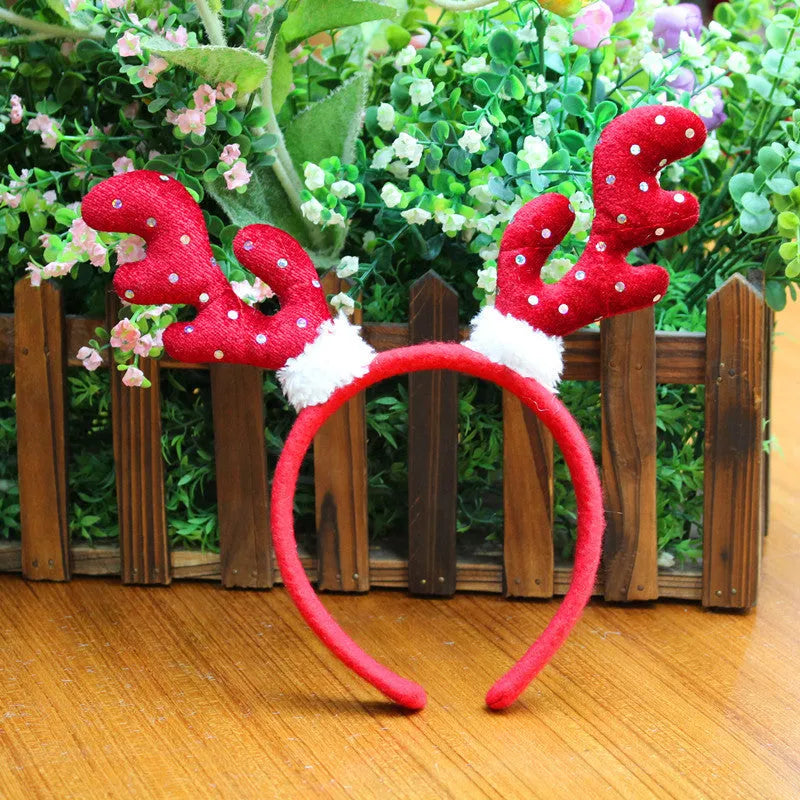 Christmas head buckle in plastic and flannel, five styles including Christmas hat, top hat, giraffe, old deer and antlers