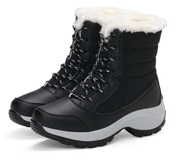 Women's high-top snow boots with synthetic leather upper, cross strap detail, and round toe, available in black