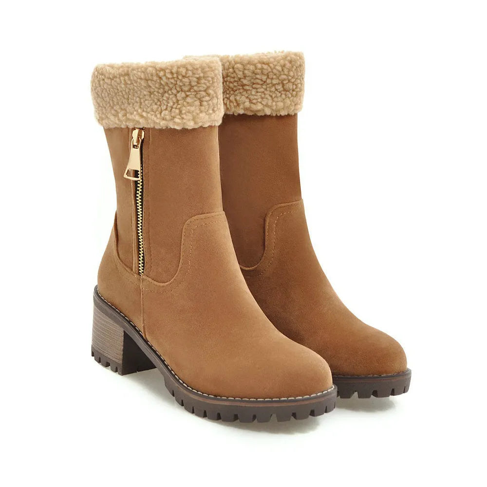 Men's black snow boot with thick rubber sole and warm lining, shown on a winter background.