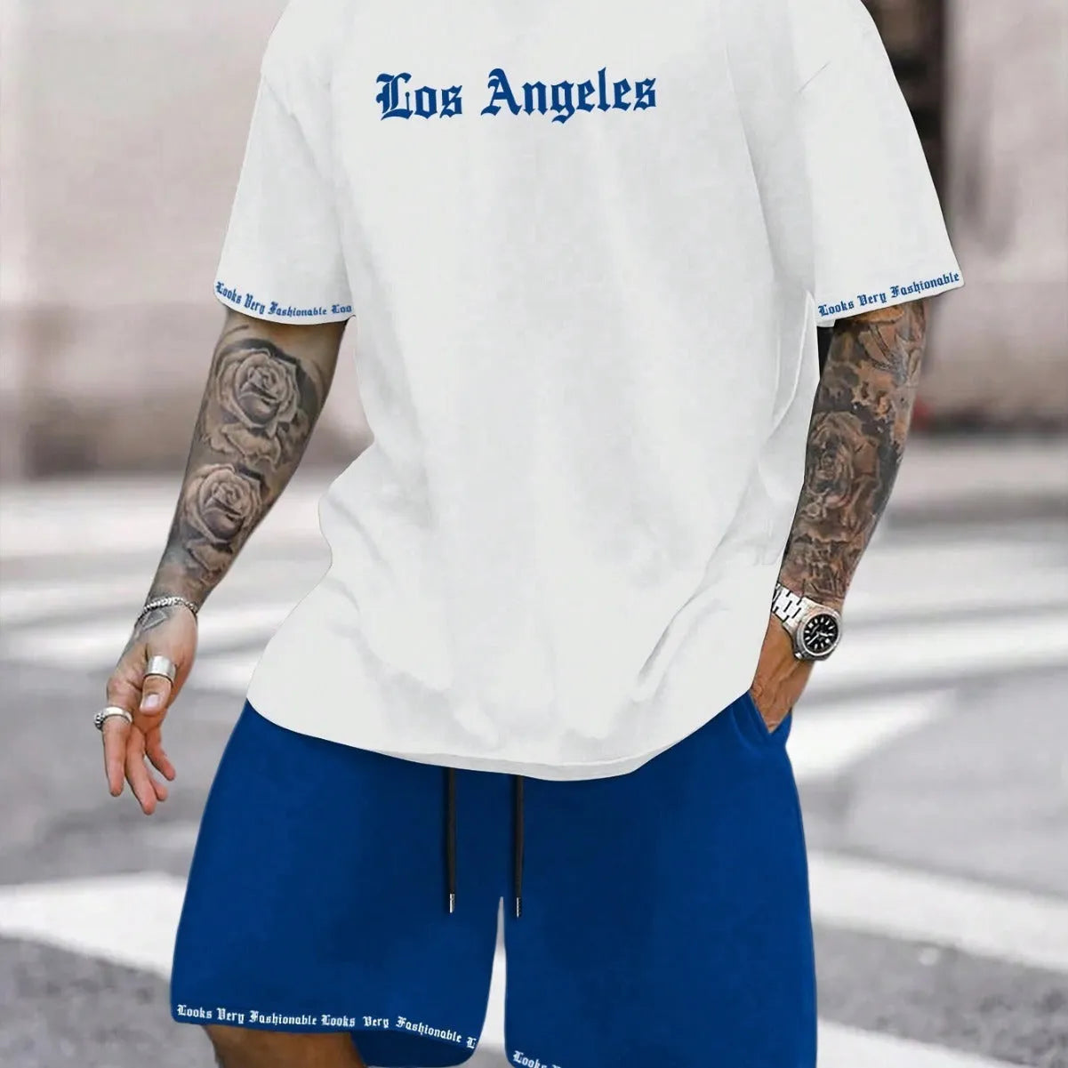 Man wearing a matching short-sleeved top and shorts from the quick-dry sports set.