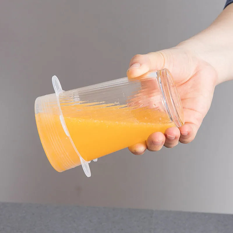 Set of six colourful silicone stretch lids in different sizes for covering bowls and food containers.