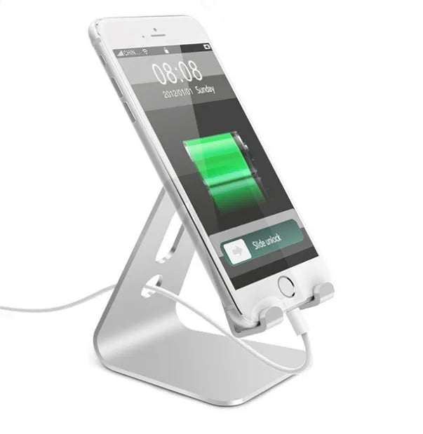 Aluminium alloy foldable phone and tablet holder in silver colour on a wooden table
