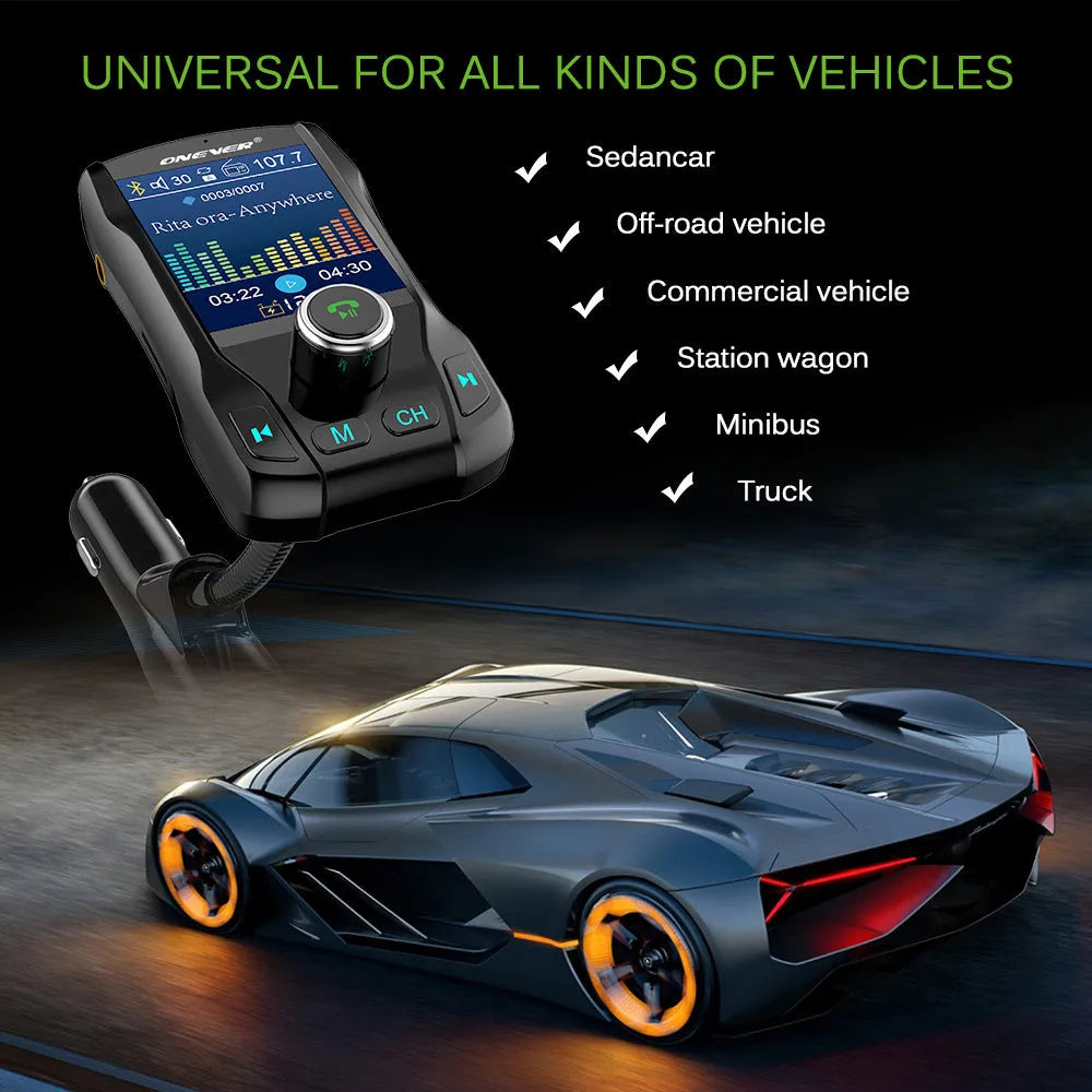 Black car Bluetooth FM transmitter with colour screen and dual USB ports plugged into a car dashboard.