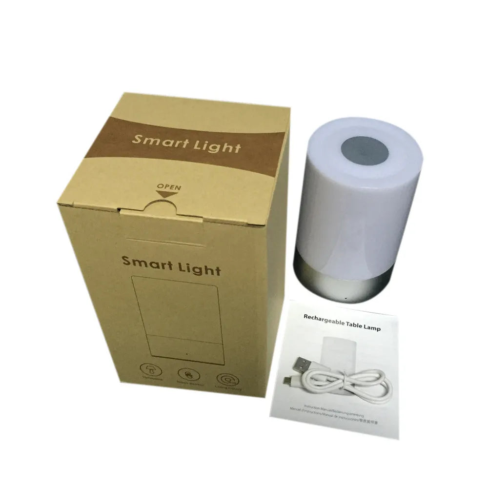 Creative Home dimmable LED bedside night light with PC plastic body on a wooden desk