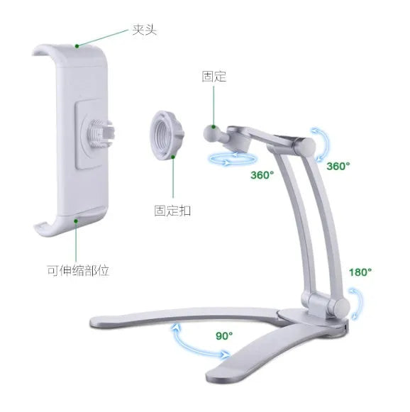 Silver aluminium desktop tablet stand holding a tablet, showing 360-degree rotation and dual adjustable clip design.