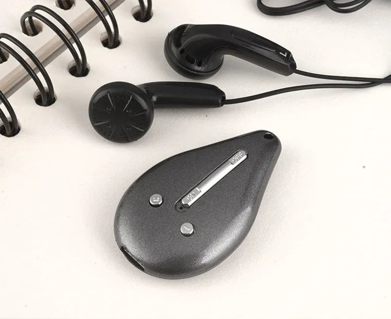 Grey mini hidden voice recorder with keychain design, 8GB memory, and USB cable