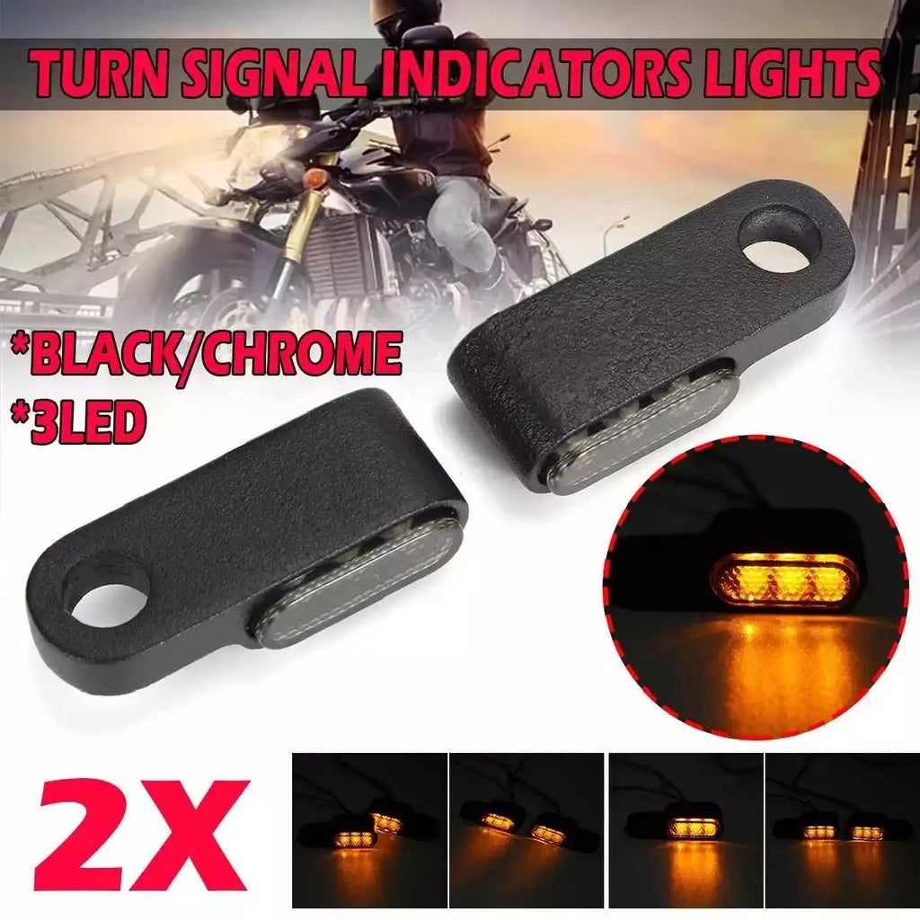 12V metal motorcycle handlebar turn signal with yellow light, shown in black or silver, single unit