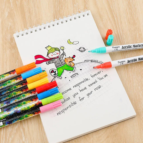 Set of six colourful acrylic marker pens with 0.7mm nibs in a plastic storage box.