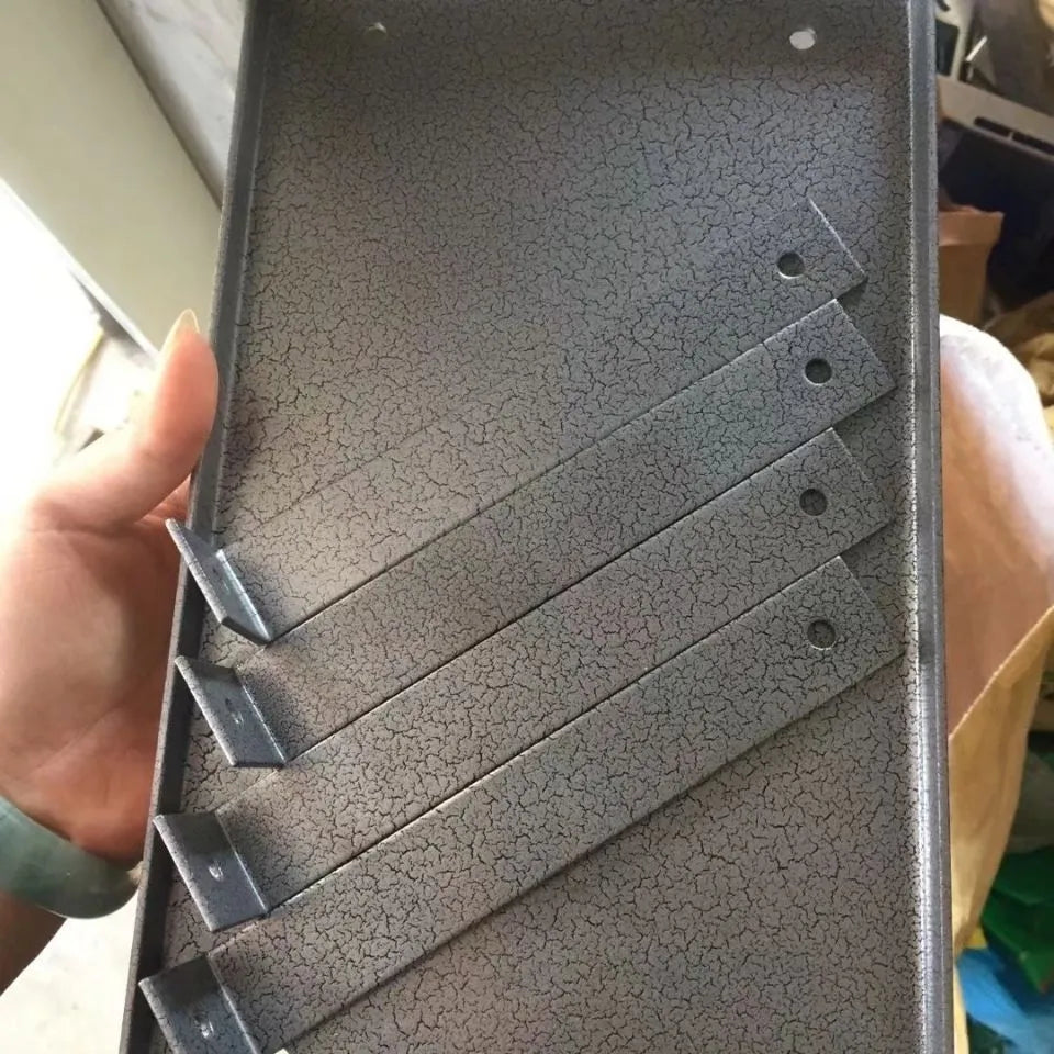 Black iron flip chip mounting bracket for a small electric planer, showing its 285mm length.