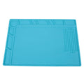Blue silicone watch repair mat with non-slip surface for component organisation during watch work