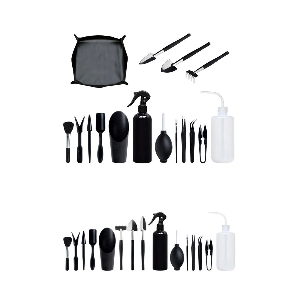 Black plastic and metal mini garden tool set with 16 pieces including small shovel, tweezers, scissors, and a grey kneeling cushion.