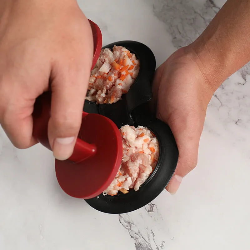 Black and red food-grade ABS plastic burger press with non-stick round moulds.
