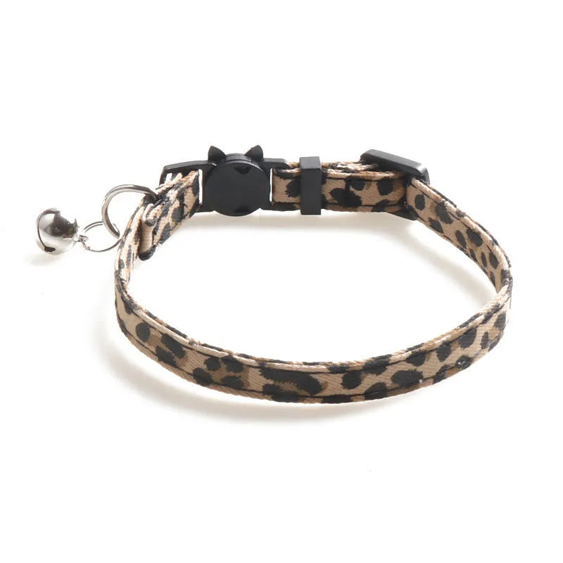 Cloth cat collar with bell, 1.0 by 28 cm, shown in brown, green and pink colour options