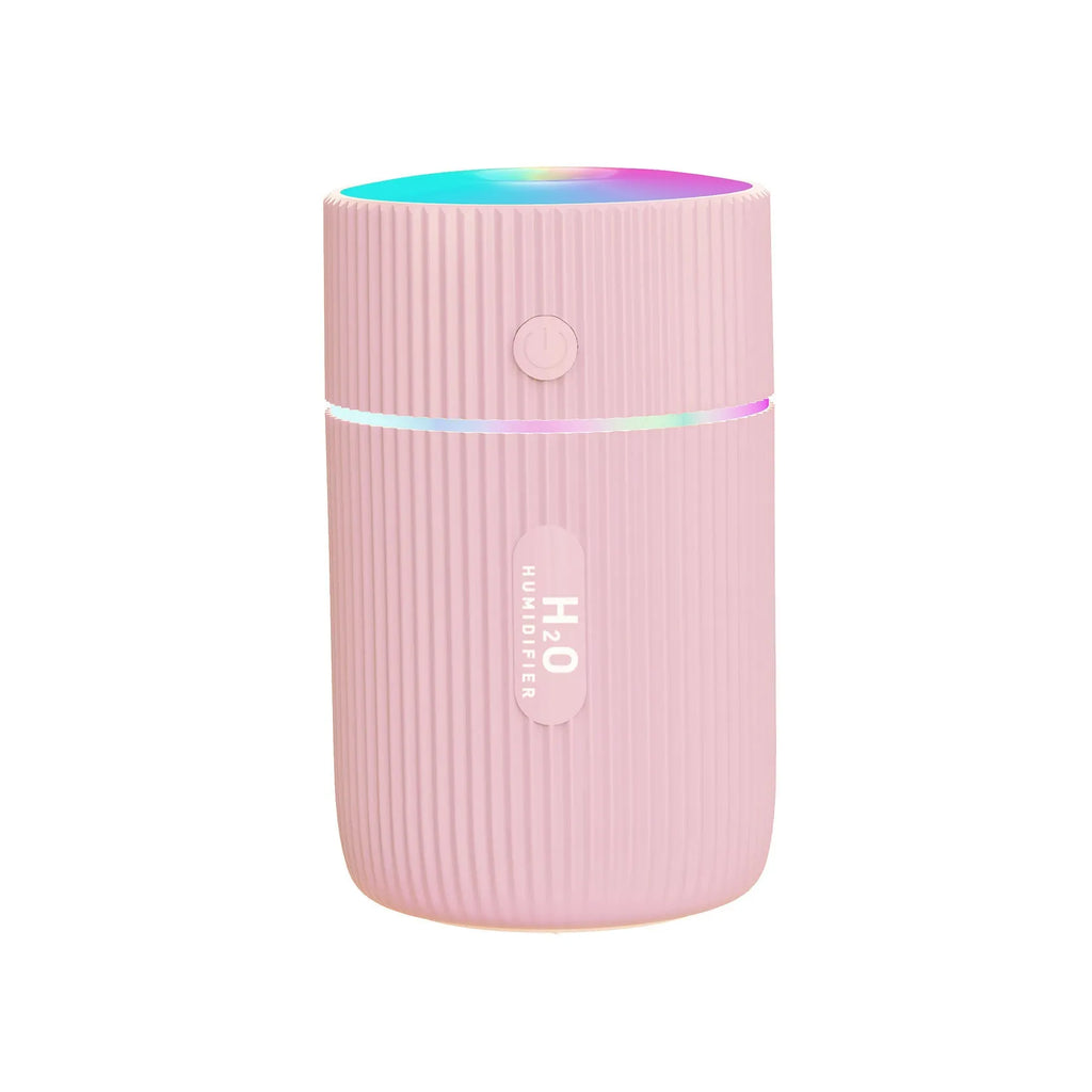 Portable ultrasonic essential oil diffuser humidifier in black, green, pink, or white with USB cable