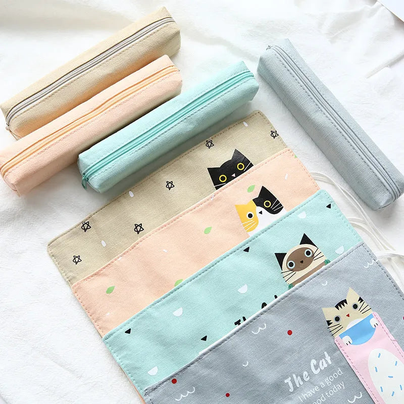 Roll-up pencil case with Korean cartoon cat pattern in blue, green, pink, or yellow.