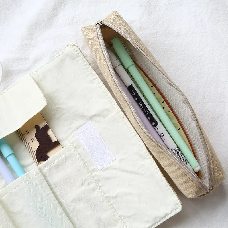 Roll-up pencil case with Korean cartoon cat pattern in blue, green, pink, or yellow.