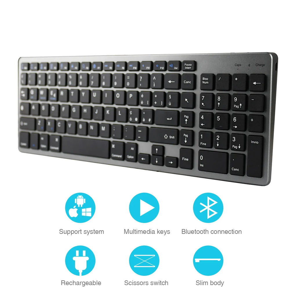 White universal rechargeable Bluetooth keyboard next to a tablet on a desk.