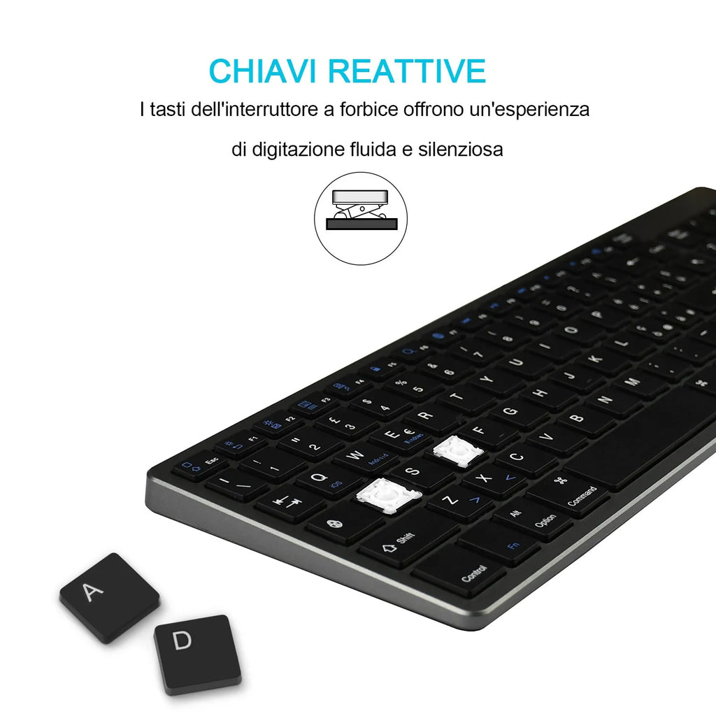 White universal rechargeable Bluetooth keyboard next to a tablet on a desk.
