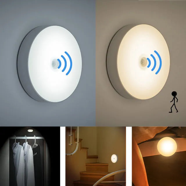 Small round white motion sensor night light with USB charging cable and adhesive tape.