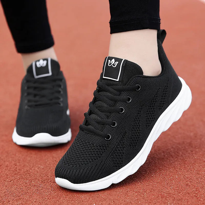 Women's white high-top casual shoes with cross-bind strap and perforated PU upper.