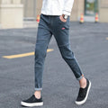 Men's black ripped ankle jeans in regular denim with micro elastic, sizes 28-34, autumn casual style