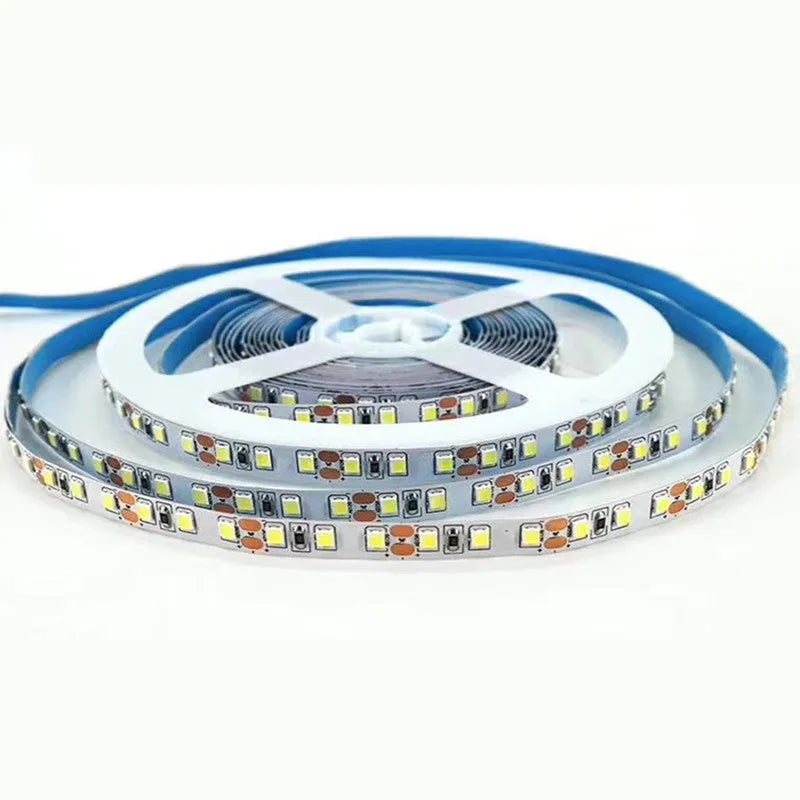 12V white LED light strip on a flexible belt for shelf and counter lighting in shops.