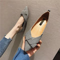 Women's red and black pointed toe low-heel casual shoes with cotton upper on a plain background.