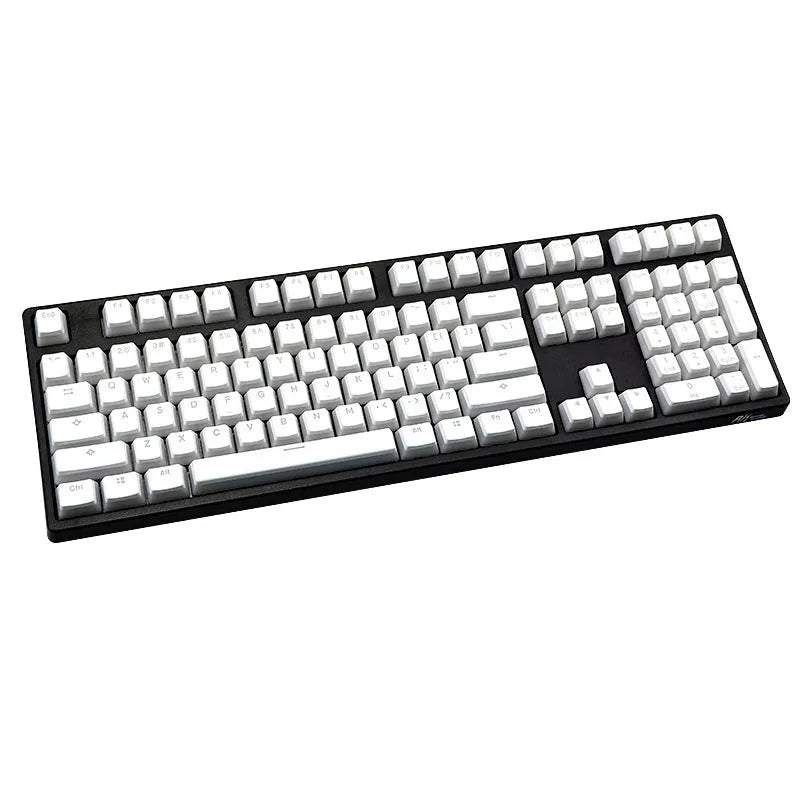 White pudding-style PBT keycap set with 141 pieces showing dye-sublimated legends on mechanical keyboard