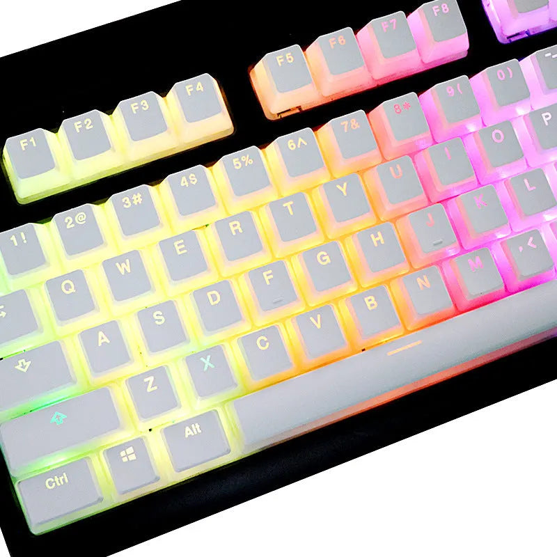 White pudding-style PBT keycap set with 141 pieces showing dye-sublimated legends on mechanical keyboard