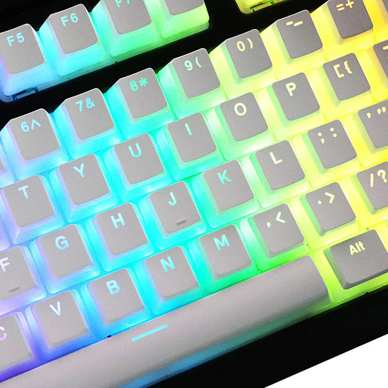 White pudding-style PBT keycap set with 141 pieces showing dye-sublimated legends on mechanical keyboard